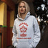 This beautifully designed hoodie features a majestic tree with deep roots, its leaves formed by the iconic Canadian maple leaf.