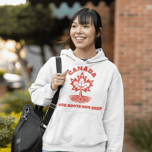 This beautifully designed hoodie features a majestic tree with deep roots, its leaves formed by the iconic Canadian maple leaf.