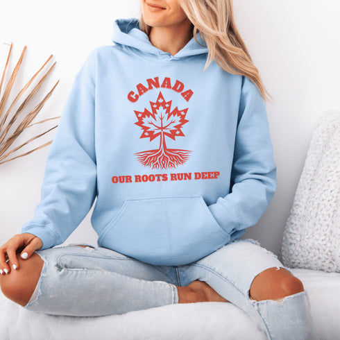 This beautifully designed hoodie features a majestic tree with deep roots, its leaves formed by the iconic Canadian maple leaf.