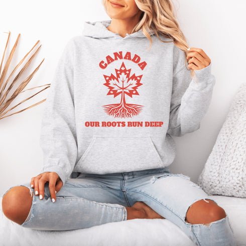 This beautifully designed hoodie features a majestic tree with deep roots, its leaves formed by the iconic Canadian maple leaf.