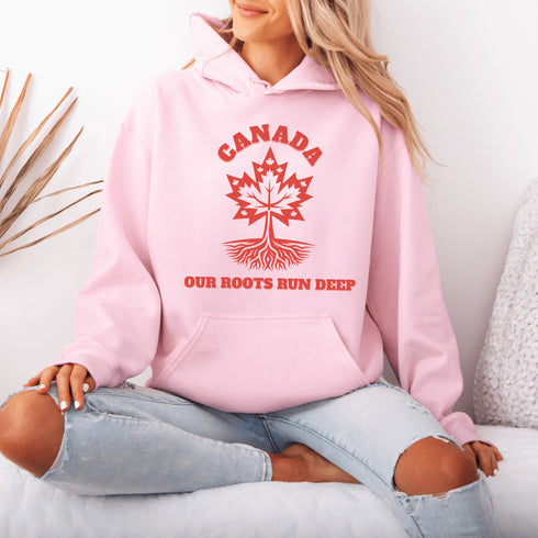 This beautifully designed hoodie features a majestic tree with deep roots, its leaves formed by the iconic Canadian maple leaf.