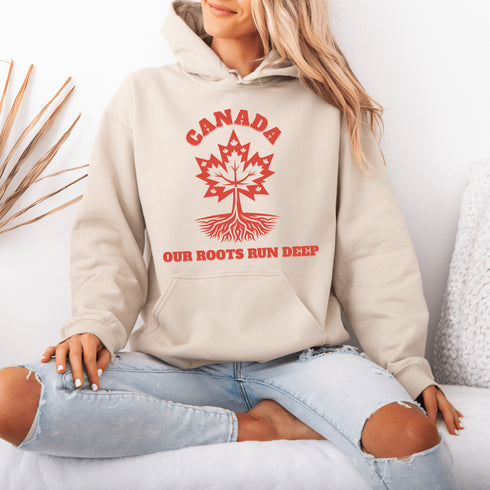 This beautifully designed hoodie features a majestic tree with deep roots, its leaves formed by the iconic Canadian maple leaf.