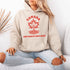 This beautifully designed hoodie features a majestic tree with deep roots, its leaves formed by the iconic Canadian maple leaf.