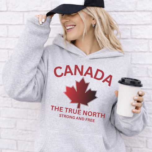 Canadian “True North Strong and Free” hoodie in light grey with red maple leaf graphic, cozy unisex Canada pride sweatshirt