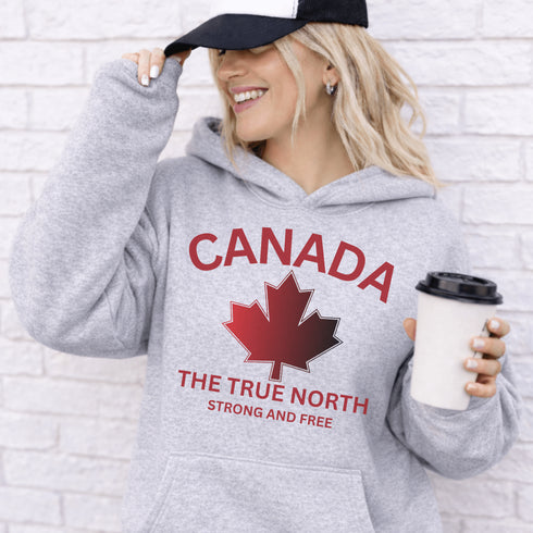 Canadian “True North Strong and Free” hoodie in light grey with red maple leaf graphic, cozy unisex Canada pride sweatshirt