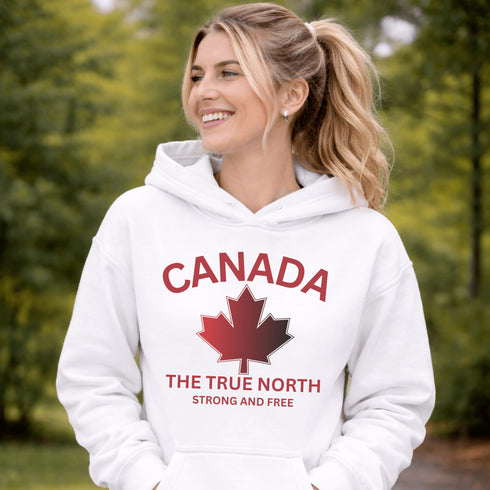 White Canada hoodie with bold maple leaf design and “True North Strong and Free” text, unisex Canadian sweatshirt