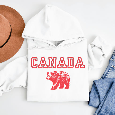 Featuring a burly bear who's as proud of Canada as he is of his fish-catching skills, this hoodie is the ultimate companion for those who want to look grizzly while staying snuggly.
