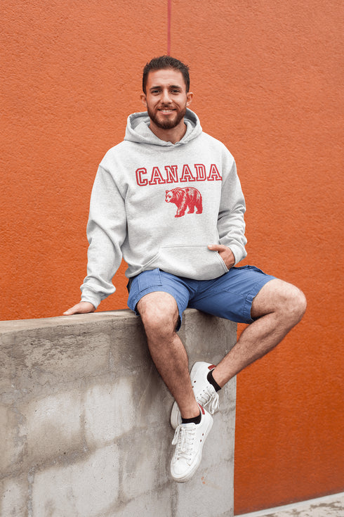 Featuring a burly bear who's as proud of Canada as he is of his fish-catching skills, this hoodie is the ultimate companion for those who want to look grizzly while staying snuggly.