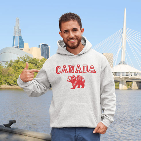 Featuring a burly bear who's as proud of Canada as he is of his fish-catching skills, this hoodie is the ultimate companion for those who want to look grizzly while staying snuggly.