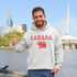 Featuring a burly bear who's as proud of Canada as he is of his fish-catching skills, this hoodie is the ultimate companion for those who want to look grizzly while staying snuggly.