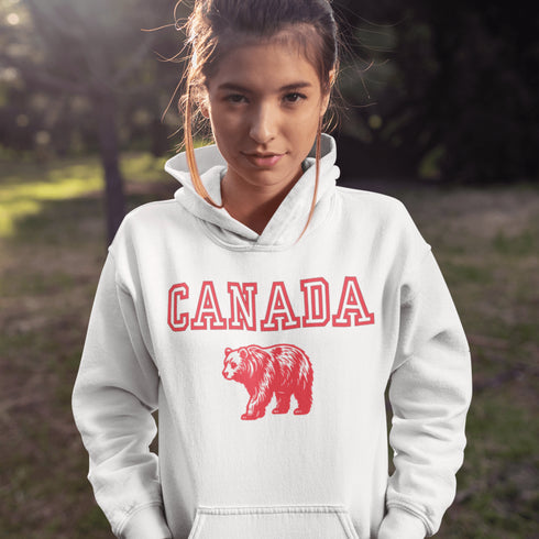 Featuring a burly bear who's as proud of Canada as he is of his fish-catching skills, this hoodie is the ultimate companion for those who want to look grizzly while staying snuggly.