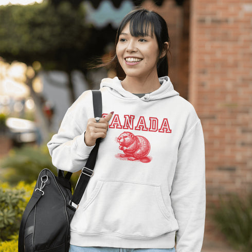 This cozy hoodie features the official mascot of Canadian chill vibes: a Canadian beaver, And smack-dab above the little guy? The iconic word "Canada," so there's no mistaking your loyalty to the land of snow, syrup, and hockey glory!
