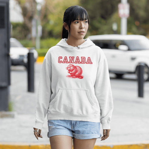 This cozy hoodie features the official mascot of Canadian chill vibes: a Canadian beaver, And smack-dab above the little guy? The iconic word "Canada," so there's no mistaking your loyalty to the land of snow, syrup, and hockey glory!