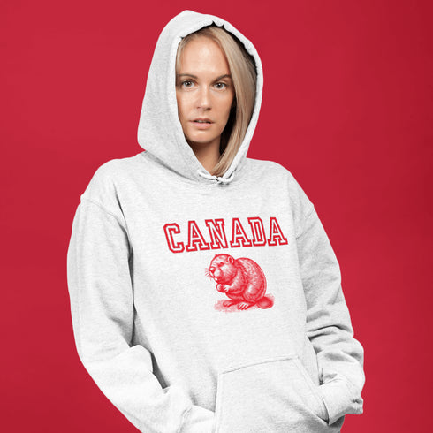 This cozy hoodie features the official mascot of Canadian chill vibes: a Canadian beaver, And smack-dab above the little guy? The iconic word "Canada," so there's no mistaking your loyalty to the land of snow, syrup, and hockey glory!