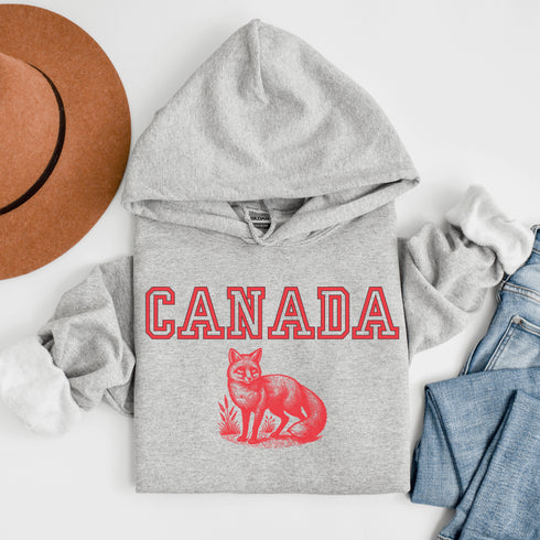 Stay sly, stylish, and downright Canadian with the Canada fox Hoodie! Featuring a clever fox, this hoodie is here to help you channel your inner trickster.