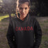 Say hello to the Oh-Canada Hoodie, featuring "Canada" in bold red and black plaid lettering that screams “I’m Canadian, and yes, I’m cozy!”
