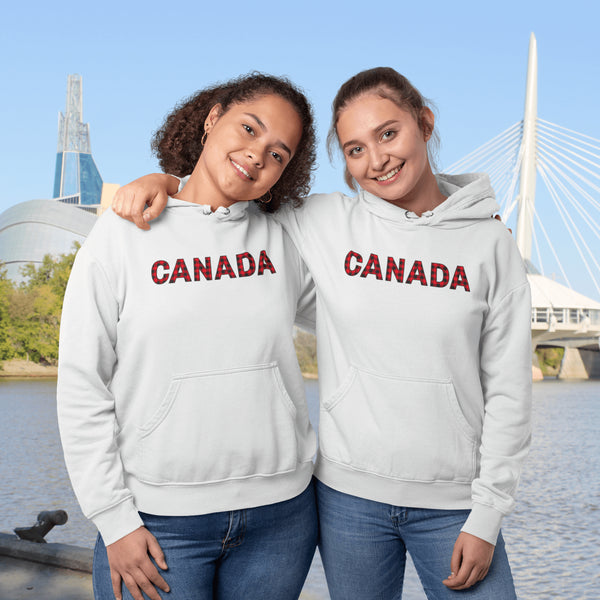 Say hello to the Oh-Canada Hoodie, featuring "Canada" in bold red and black plaid lettering that screams “I’m Canadian, and yes, I’m cozy!”