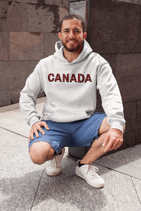 Say hello to the Oh-Canada Hoodie, featuring "Canada" in bold red and black plaid lettering that screams “I’m Canadian, and yes, I’m cozy!”