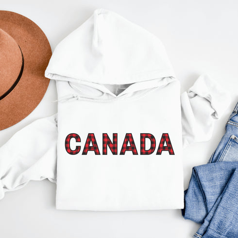 Say hello to the Oh-Canada Hoodie, featuring "Canada" in bold red and black plaid lettering that screams “I’m Canadian, and yes, I’m cozy!”