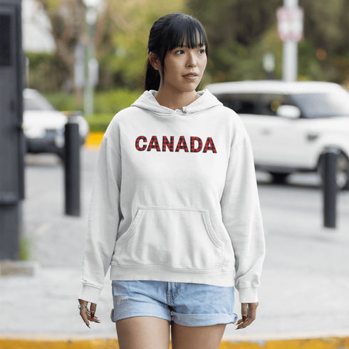 Say hello to the Oh-Canada Hoodie, featuring "Canada" in bold red and black plaid lettering that screams “I’m Canadian, and yes, I’m cozy!”