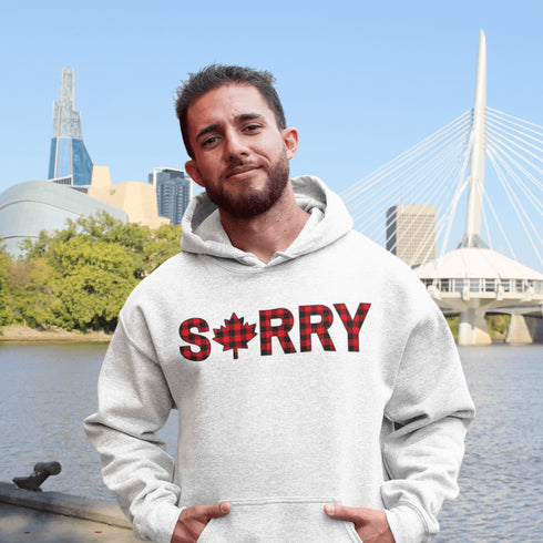 Say “Sorry” the Canadian way with our Sorry, Eh? Hoodie! Featuring "Sorry" in red and black plaid with a maple leaf as the “O,” this hoodie is apologetically Canadian in every way.