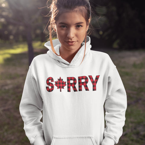 Say “Sorry” the Canadian way with our Sorry, Eh? Hoodie! Featuring "Sorry" in red and black plaid with a maple leaf as the “O,” this hoodie is apologetically Canadian in every way.