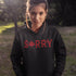 Say “Sorry” the Canadian way with our Sorry, Eh? Hoodie! Featuring "Sorry" in red and black plaid with a maple leaf as the “O,” this hoodie is apologetically Canadian in every way.