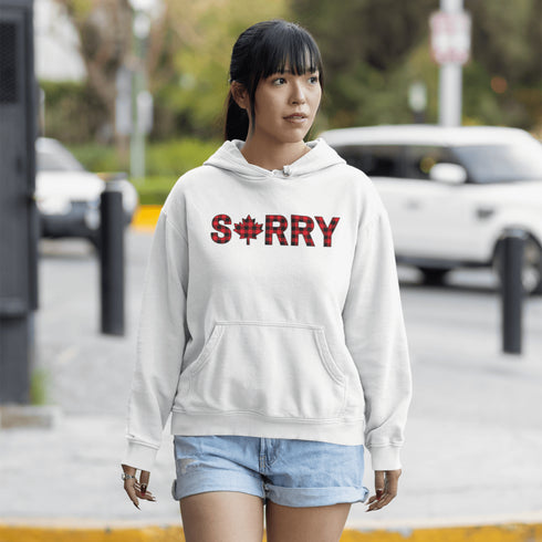 Say “Sorry” the Canadian way with our Sorry, Eh? Hoodie! Featuring "Sorry" in red and black plaid with a maple leaf as the “O,” this hoodie is apologetically Canadian in every way.