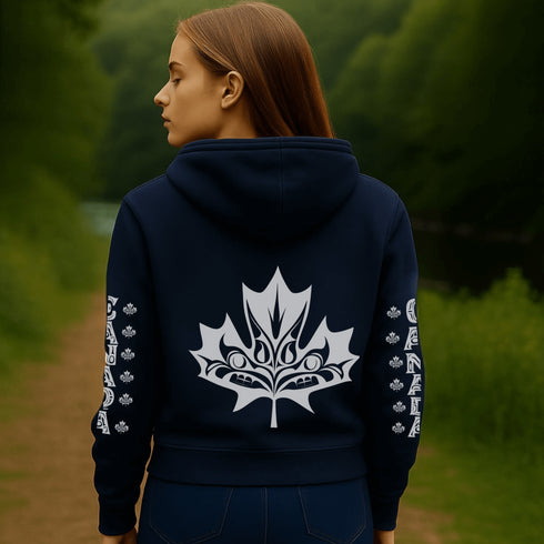 Premium Canada hoodie featuring Indigenous-inspired maple leaf art and Canada sleeve print. Cozy unisex sweatshirt perfect for travel, gifts, and everyday wear.