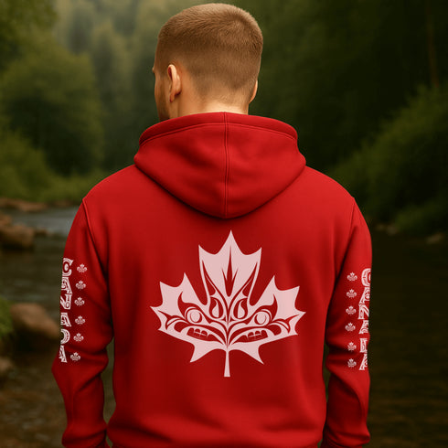 Premium Canada hoodie featuring Indigenous-inspired maple leaf art and Canada sleeve print. Cozy unisex sweatshirt perfect for travel, gifts, and everyday wear.