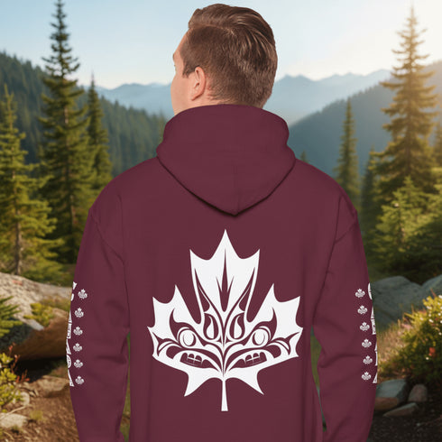 Premium Canada hoodie featuring Indigenous-inspired maple leaf art and Canada sleeve print. Cozy unisex sweatshirt perfect for travel, gifts, and everyday wear.