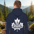 Premium Canada hoodie featuring Indigenous-inspired maple leaf art and Canada sleeve print. Cozy unisex sweatshirt perfect for travel, gifts, and everyday wear.