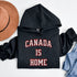 This Canada Is Home hoodie is for those who know that home is where the maple syrup flows, the hockey never stops, and the weather keeps you on your toes.