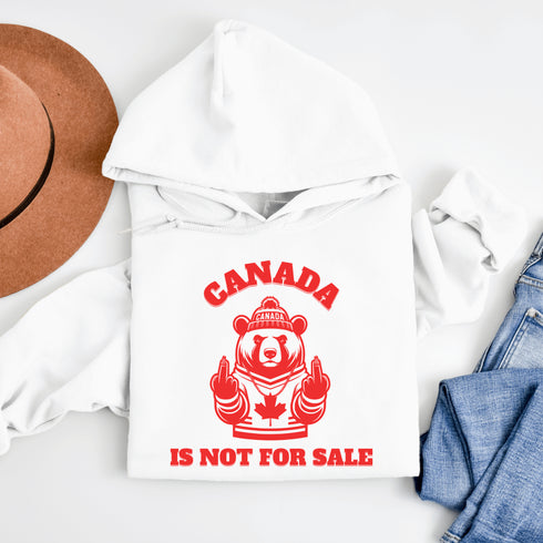 Show off your unapologetic Canadian pride with our bold and rebellious "Canada Is Not For Sale" hoodie. Featuring a feisty bear rocking a Canada shirt and hat.