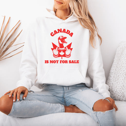 Show off your unapologetic Canadian pride with our bold and rebellious "Canada Is Not For Sale" hoodie. Featuring a feisty goose rocking a Canada shirt and hat