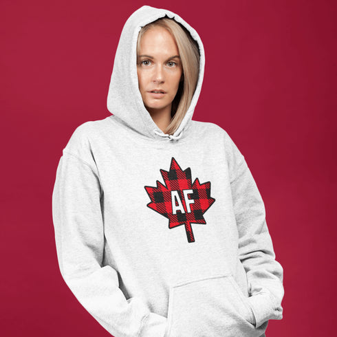 Featuring a red & black plaid maple leaf and the letters “AF” proudly displayed, this hoodie is for anyone who’s unapologetically Canadian… AF.