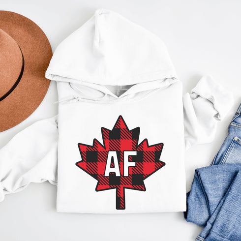 Featuring a red & black plaid maple leaf and the letters “AF” proudly displayed, this hoodie is for anyone who’s unapologetically Canadian… AF.