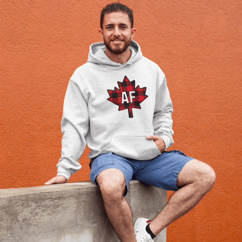 Featuring a red & black plaid maple leaf and the letters “AF” proudly displayed, this hoodie is for anyone who’s unapologetically Canadian… AF.