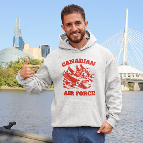 Defend the skies (or at least the local pond) with our "Canadian Air Force" hoodie! Featuring a flock of geese flying in a perfect fighter jet formation