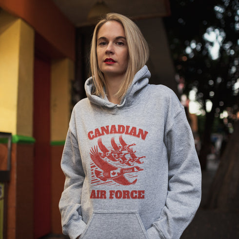 Defend the skies (or at least the local pond) with our "Canadian Air Force" hoodie! Featuring a flock of geese flying in a perfect fighter jet formation