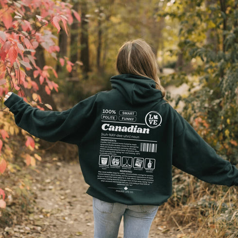 Show your Canadian pride with this funny Canadian definition hoodie featuring maple syrup, hockey, poutine and double-doubles. A cozy hoodie perfect for true Canadians.