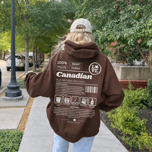 Show your Canadian pride with this funny Canadian definition hoodie featuring maple syrup, hockey, poutine and double-doubles. A cozy hoodie perfect for true Canadians.
