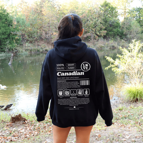 Show your Canadian pride with this funny Canadian definition hoodie featuring maple syrup, hockey, poutine and double-doubles. A cozy hoodie perfect for true Canadians.