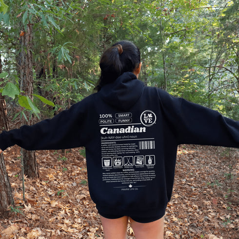 Show your Canadian pride with this funny Canadian definition hoodie featuring maple syrup, hockey, poutine and double-doubles. A cozy hoodie perfect for true Canadians.