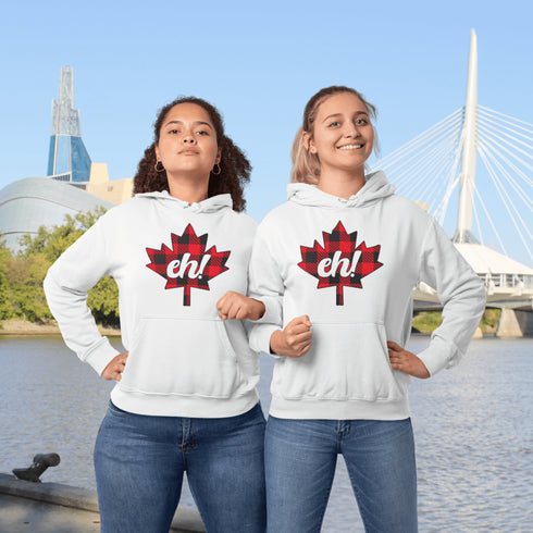 Featuring a bold Canadian maple leaf in classic red and black plaid with a proudly placed "Eh!" on the front, this hoodie is as Canadian as maple syrup on poutine.