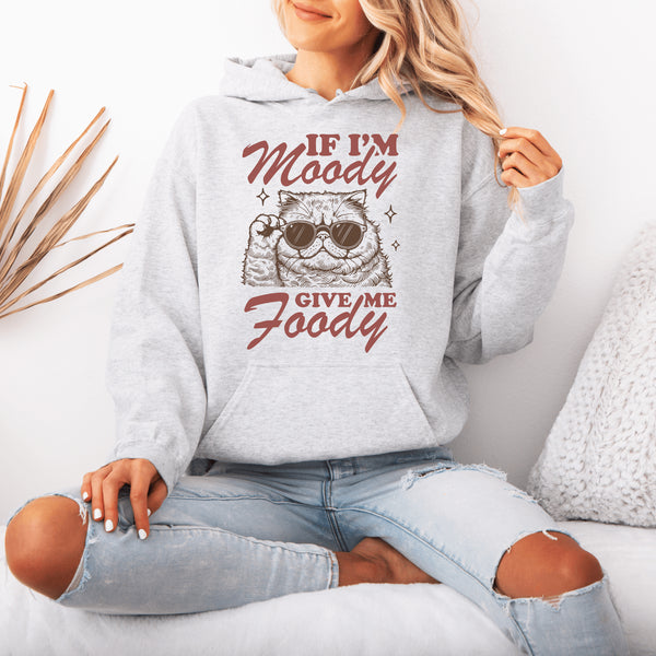 Introducing the purr-fect hoodie for anyone whose mood is directly proportional to their snack supply.