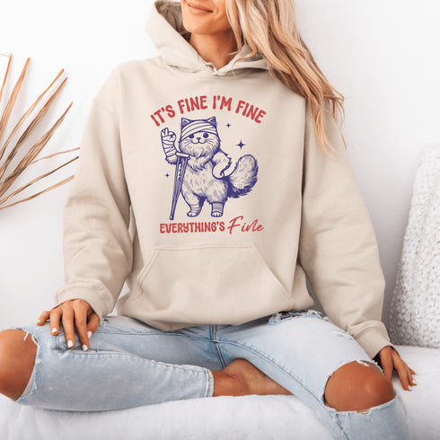 Because nothing says "I’ve got it together" like a cat on crutches with a bandaged head proclaiming, "It’s Fine. I’m Fine. Everything Is Fine."