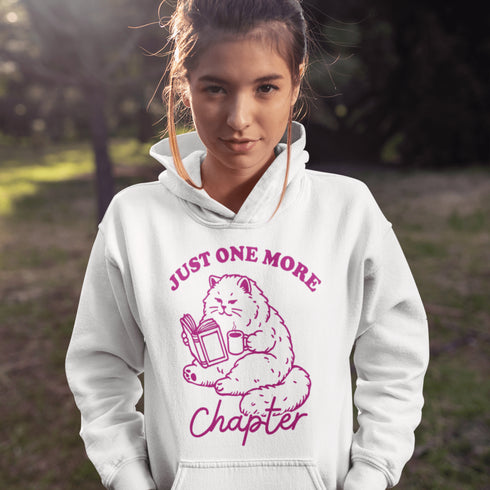 This hoodie features a studious cat perched with a book, proving that even felines can't resist the pull of "just one more chapter."