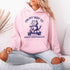 Featuring a playful illustration of a determined cat riding a scooter, this hoodie is the purr-fect way to announce your cat-loving intentions to the world.