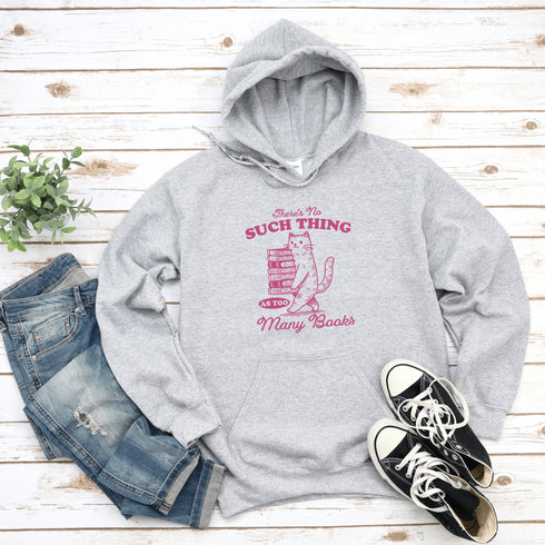 Introducing the purr-fect hoodie for book lovers and feline fanatics! Featuring a scholarly kitty confidently balancing a teetering tower of books